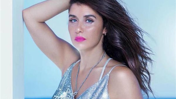 غادة عادل تثير ضجة بصورتها مع ابنها في عيد ميلاده 