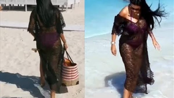 مايوه وبطانة وفستان بـ سرة.. رانيا يوسف تواصل إثارة الجدل | صور