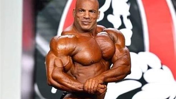 أفضل لاعب كمال أجسام في العالم يهزم الأمريكان ويفوز بذهبية مستر أولمبيا.. حكاية بيج رامي | شاهد