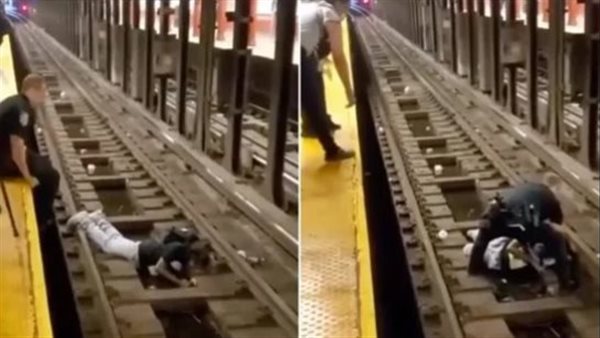 بطل..شرطي ينقذ مواطنا من الموت بعد سقوطه على قضبان مترو الأنفاق| شاهد 