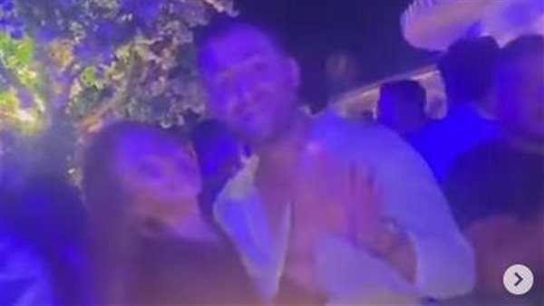 أحضان وقبلات..ضُرة بوسي ترقص مع هشام ربيع في فيديو جديد بشهر العسل | شاهد