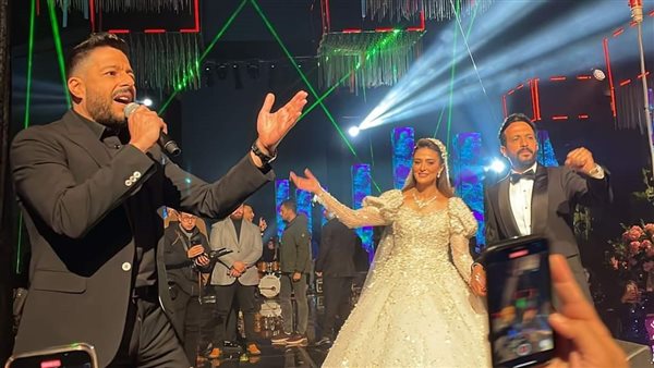 فستان خيالي.. تفاصيل إطلالة زوجة أحمد عصام في حفل زفافها | شاهد