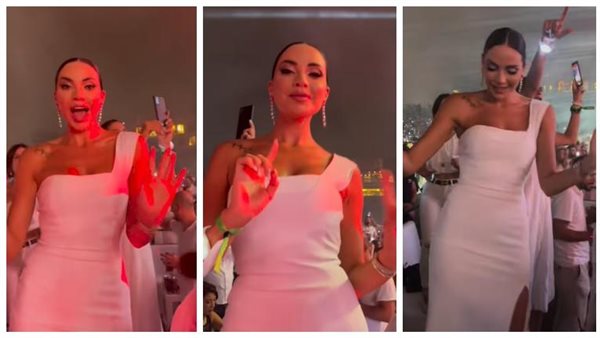 فستان أبيض أنيق.. وصلة رقص لـ داليدا خليل بحفلة عمرو دياب | شاهد