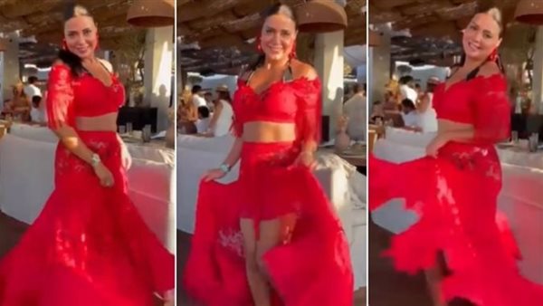 بالأحمر الشفاف.. إطلالة رانيا يوسف فى حفل زفاف بشرى تثير الجدل | شاهد