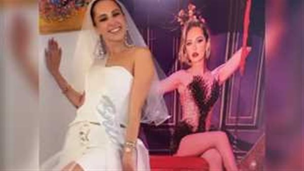 الفرق كبير.. عارضة أزياء ترتدي فستان ياسمين رئيس تثير الجدل بالسوشيال ميديا | شاهد