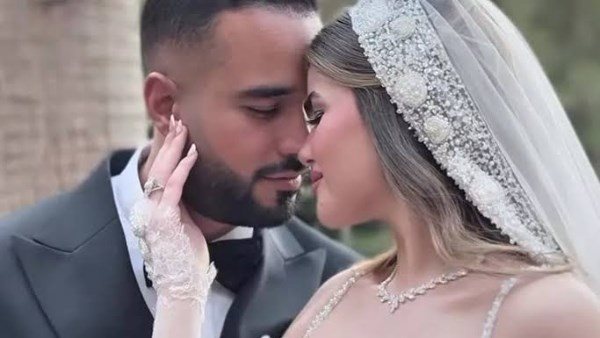  إطلالة ملكية تخطف الأنظار.. ابنة محمد فؤاد تثير ضجة في حفل زفافها | شاهد